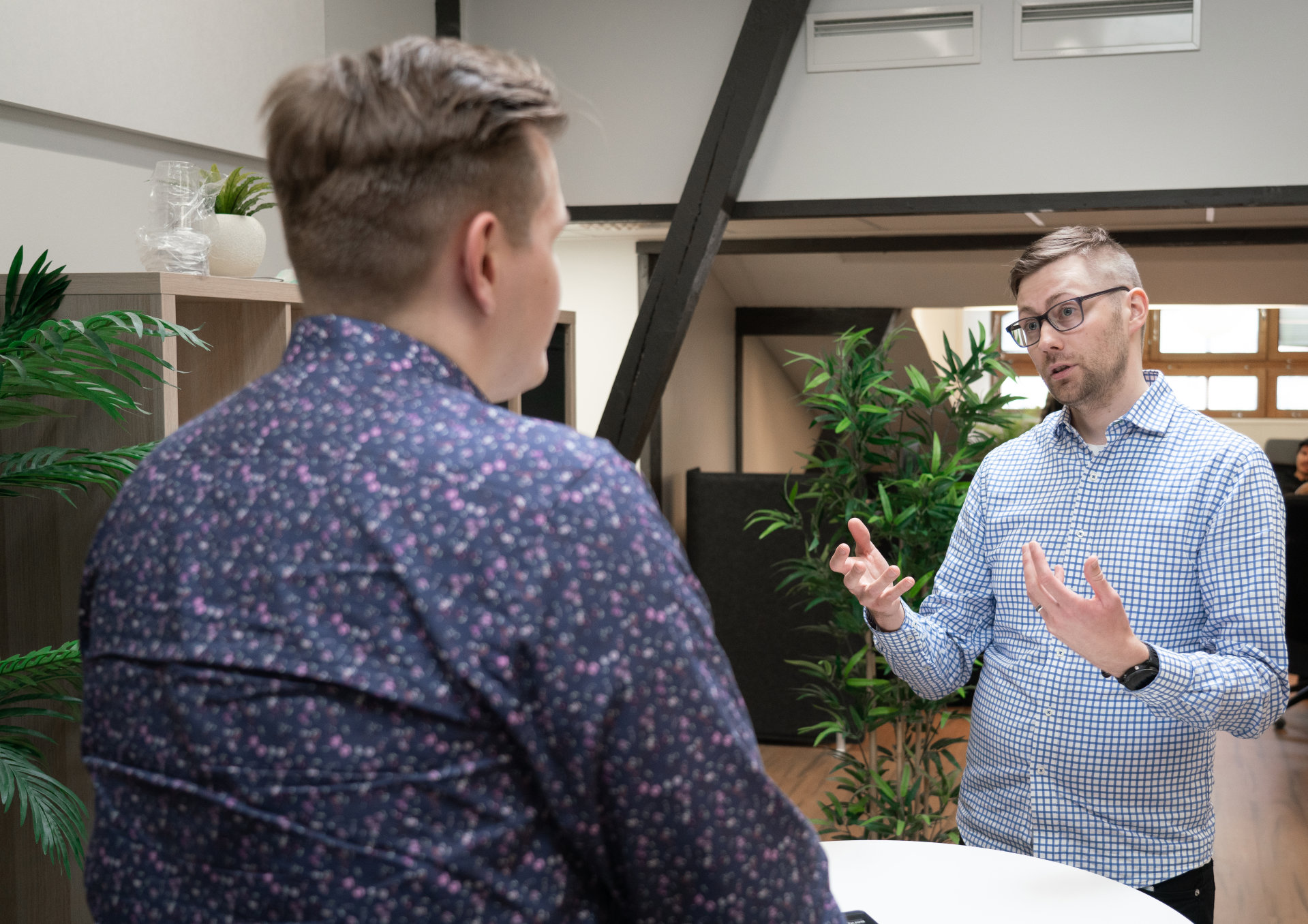 Two people discussing about lead generation