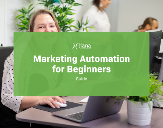 Marketing Automation for Beginners Guide woman sitting at computer