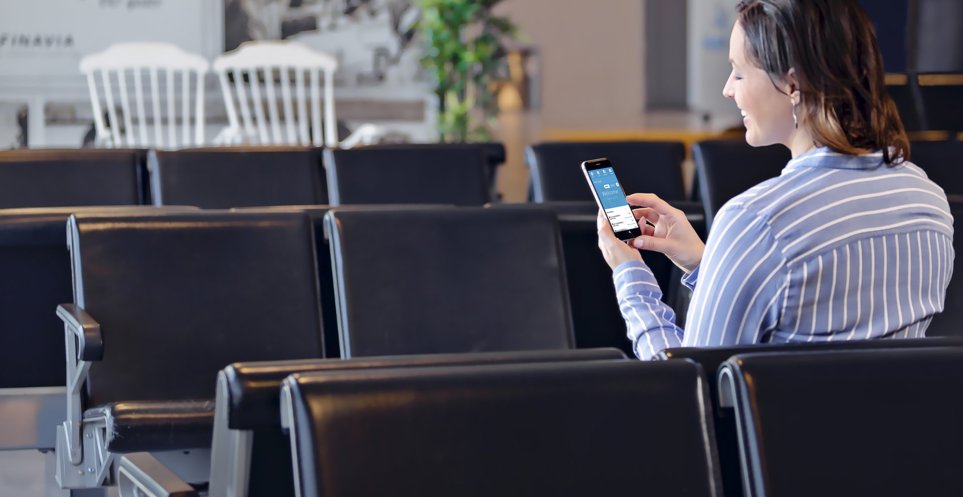 Business woman working on mobile device