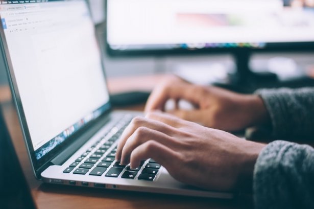 Writing on a laptop keyboard