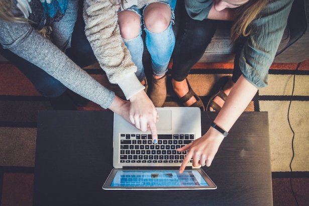 People working on a laptop