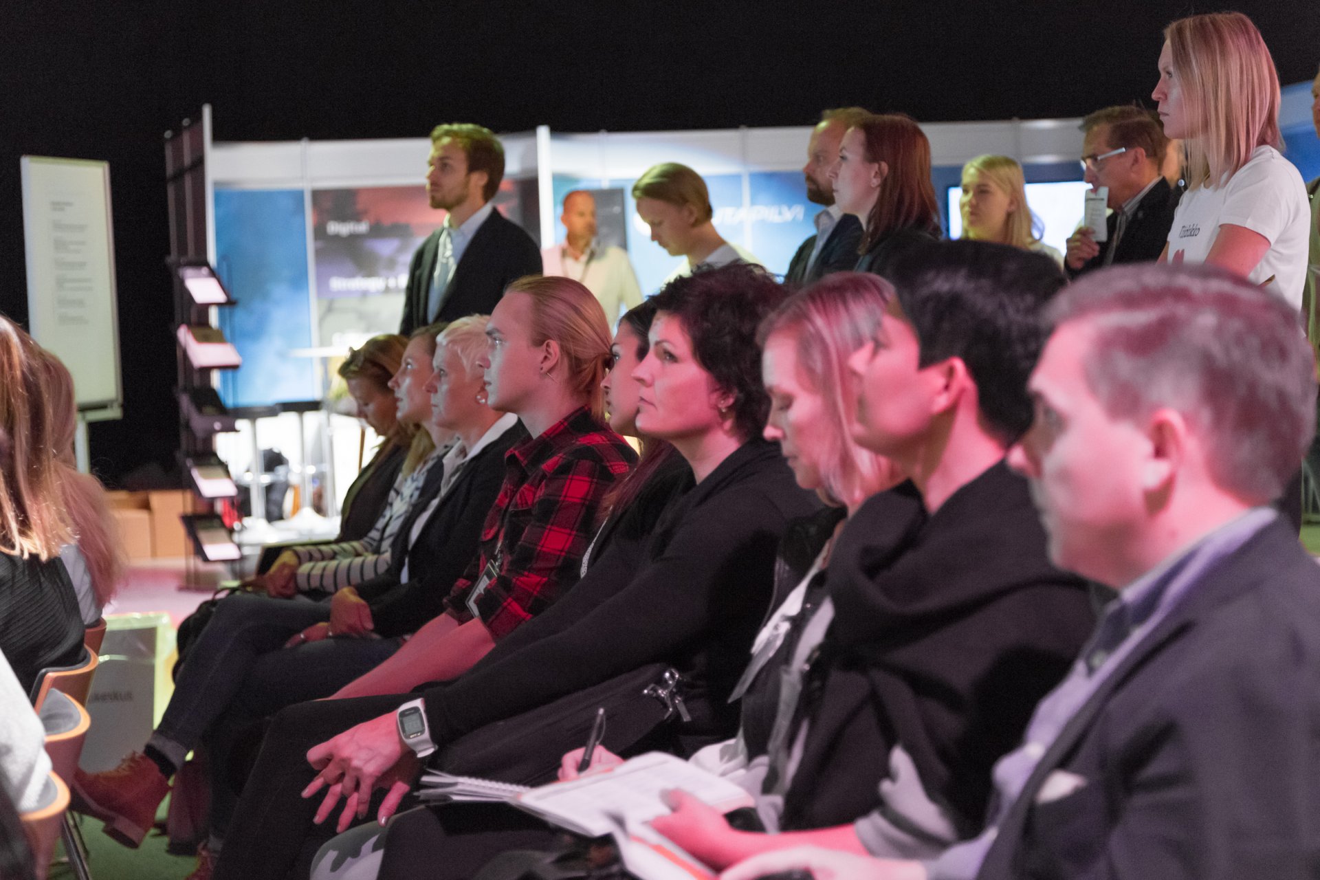 People attending an event organized by Liana Technologies