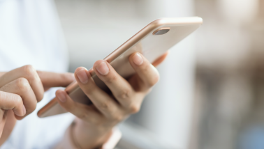 Social media monitoring is being done on a phone.