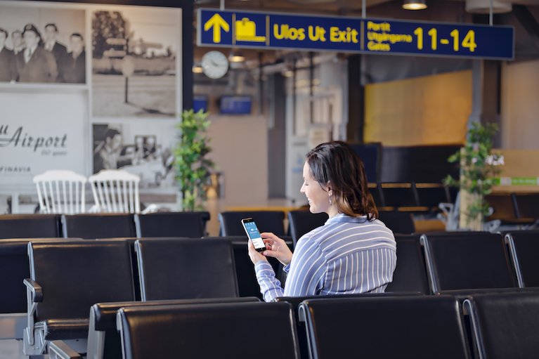 A person using marketing automation platform LianaAutomation on phone.